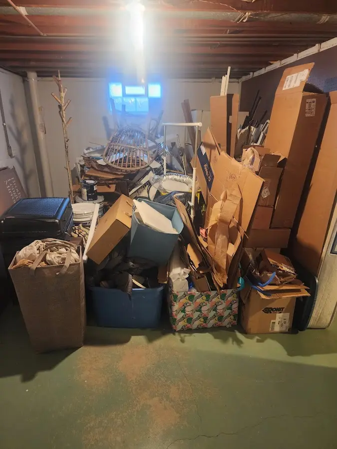 Roll-off dumpster container at job site for 6 Yard Dumpster Rental in Williamstown